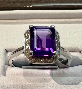 10k white gold amethyst and diamond ring.