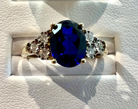 Created blue sapphire and diamond ring; set in 10K yellow gold.
1 Sapphire: 6x8mm
6 Diamonds: 0.10 carat total