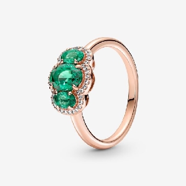 Pandora® sterling silver; 14k rose gold plated; Three Stone Vintage Ring with green crystal.
Size 7.5