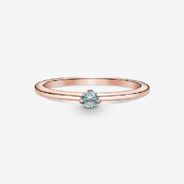 Pandora® Rose ring with bleached aqua blue crystal.
Size 9