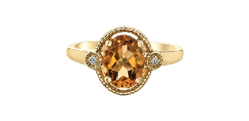 10K yellow gold citrine and diamond ring.
1 Citrine: 9x7mm
2 fancy cut diamonds: .02 carat total
Canadian Certified Gold