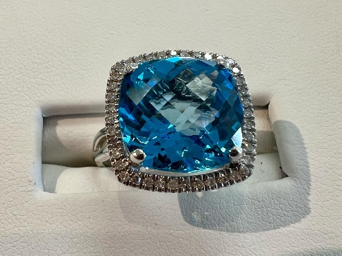 10K White Gold & Blue Topaz Ring
12x12MM blue topaz
40 diamonds
Canadian Certified Gold