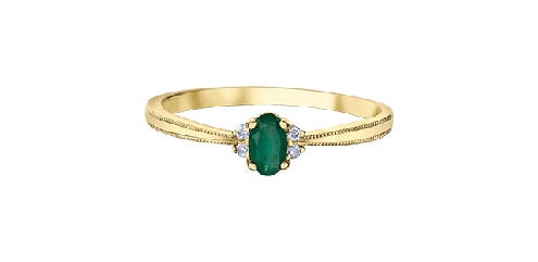 10k yellow gold emerald and diamond ring.

1 Emerald 5x3mm
4 Fancy Cut Diamonds 0.03ct

Canadian Certified Gold.