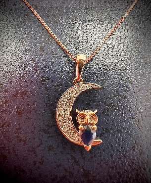 10K rose gold diamond and pear shaped sapphire and black diamond OWL on MOON pendant with chain